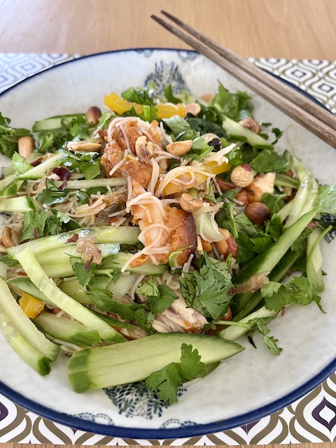 Thai stir-fry noodles with chicken and pak choi.