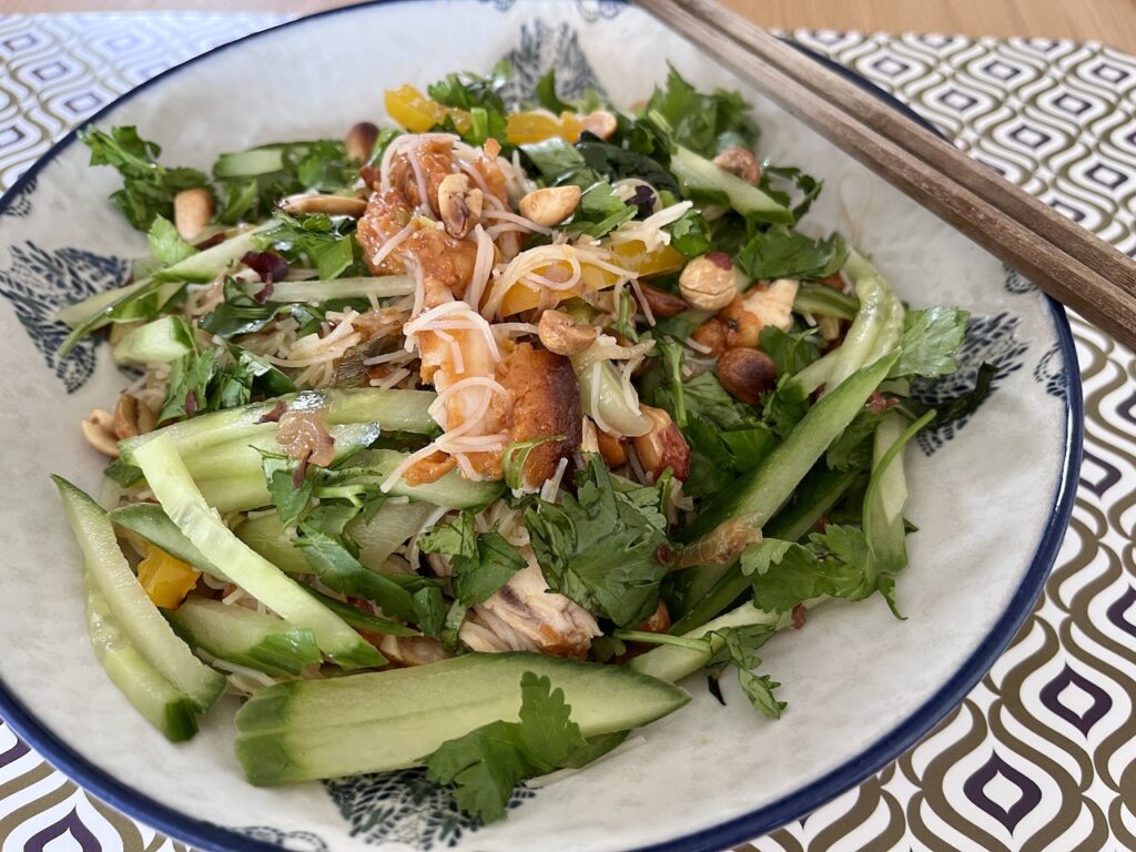 Thai stir-fry noodles with chicken and pak choi.