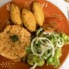 bacauhal croquette with tomato rice, a typical Portuguese dish.