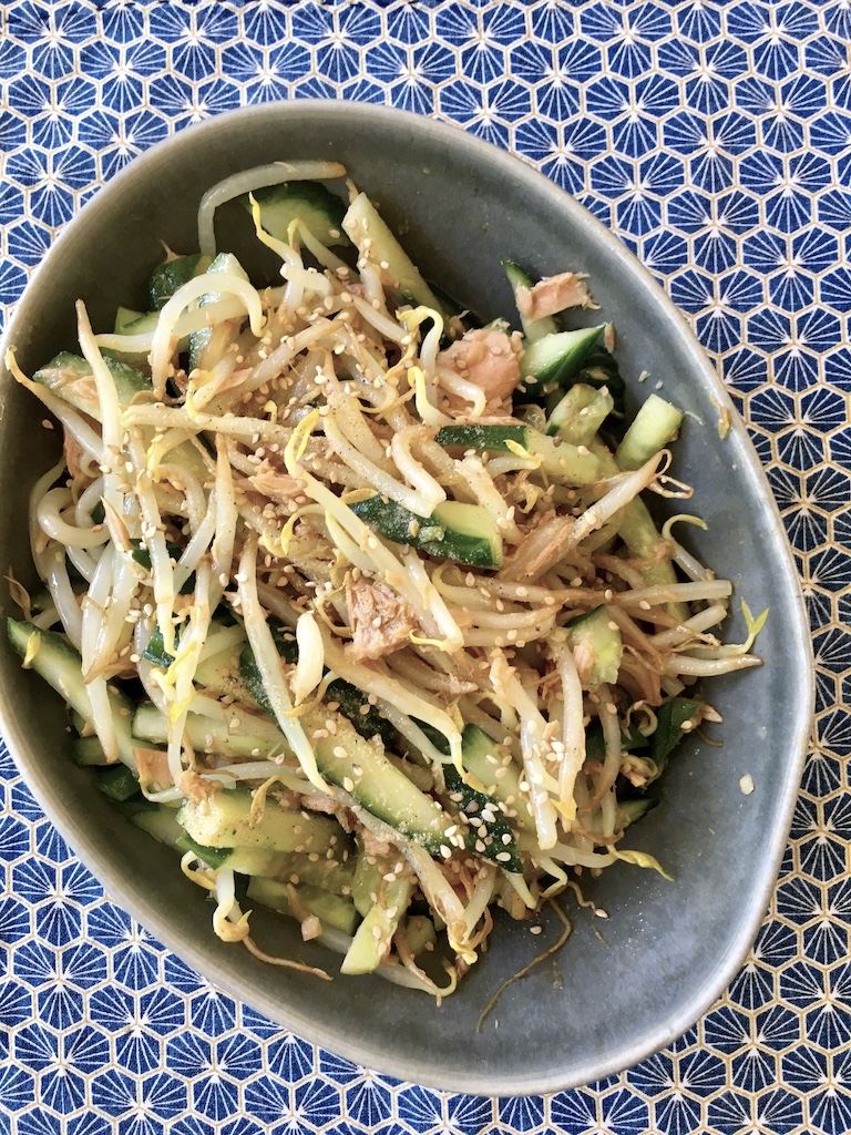 A Korean side dish, namul, made with cucumber, beans sprouts and canned tuna.