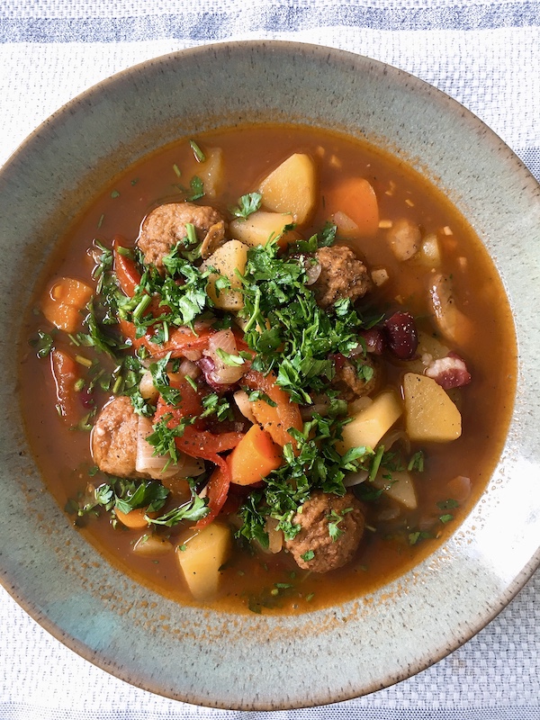 A bowl of kidney beans stew with IKEA meatballs.