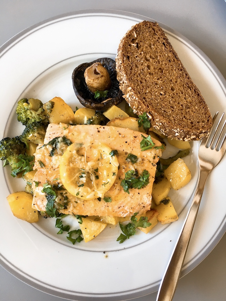 Lemon garlic butter sauce with salmon and roasted veggies.