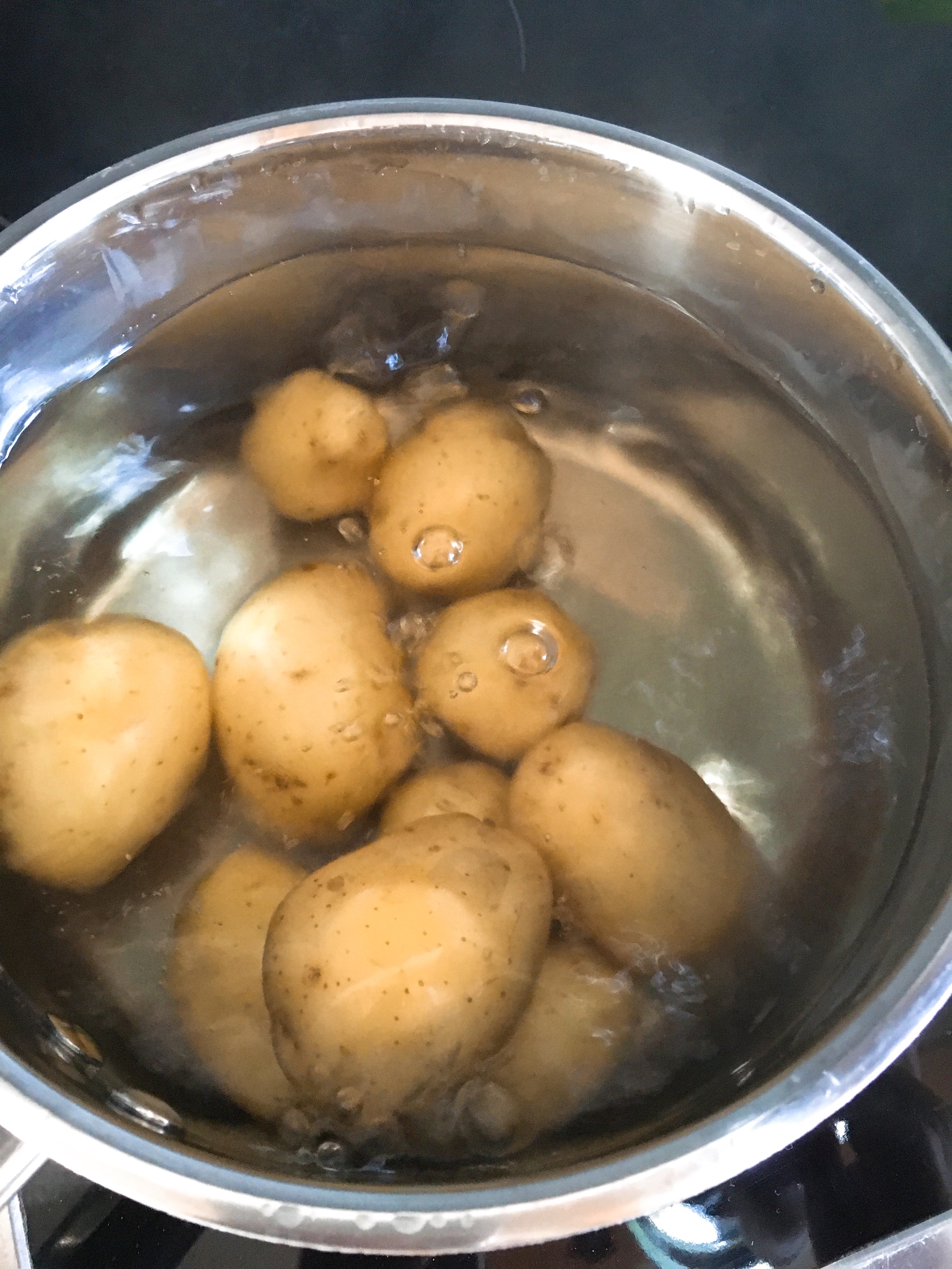 Boil potatoes.