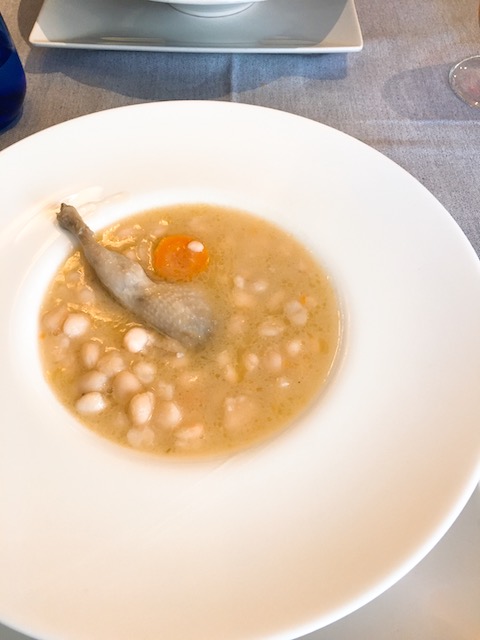 El Encuentro main course, White beans from Navarra with quail.