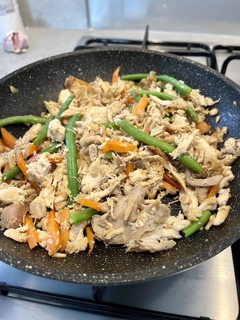 Stir-fried chicken and vegetables for the chicken pho.