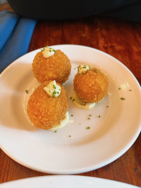 Caper and Cure croquettes with kaffir leaves mayo.