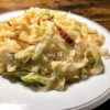 Spicy stir-fried glass noodles with cabbage.