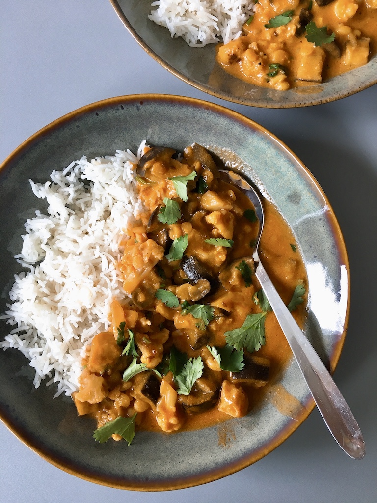 South Indian style baked aubergine and coconut curry with rice.