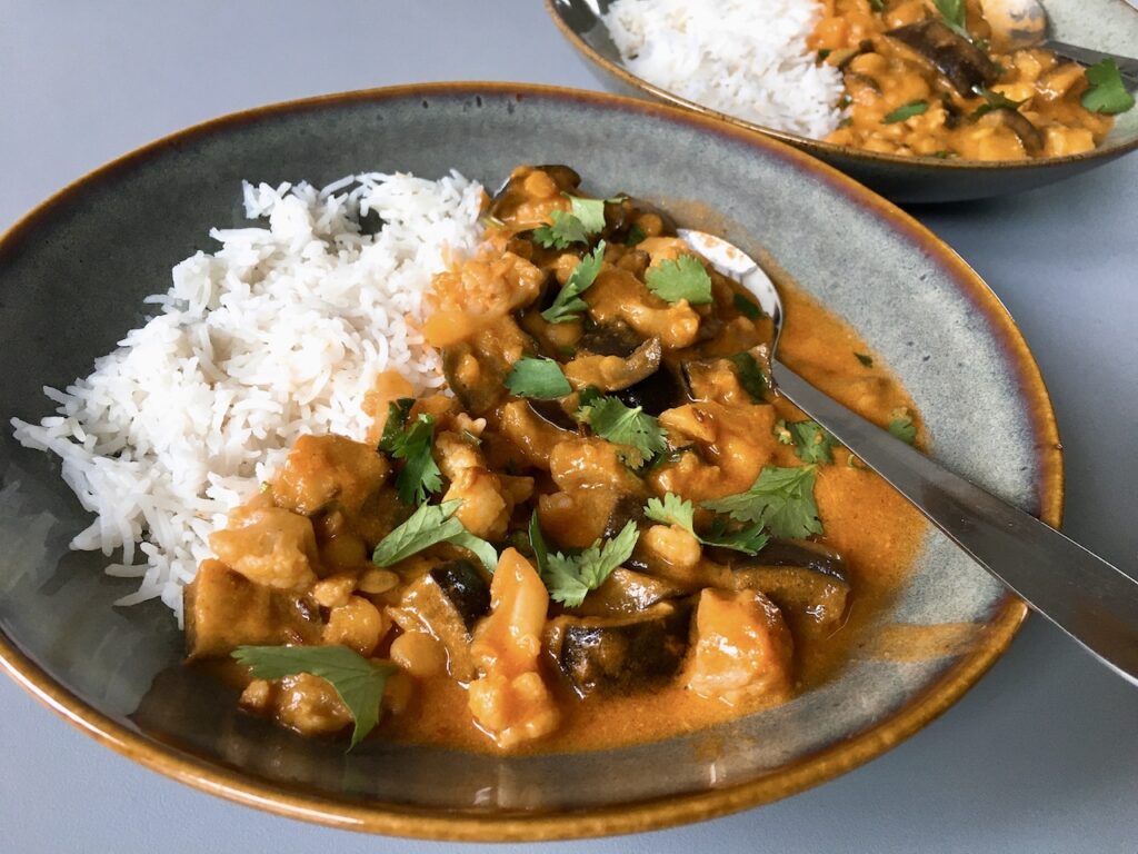 South Indian style baked aubergine and coconut curry with rice.