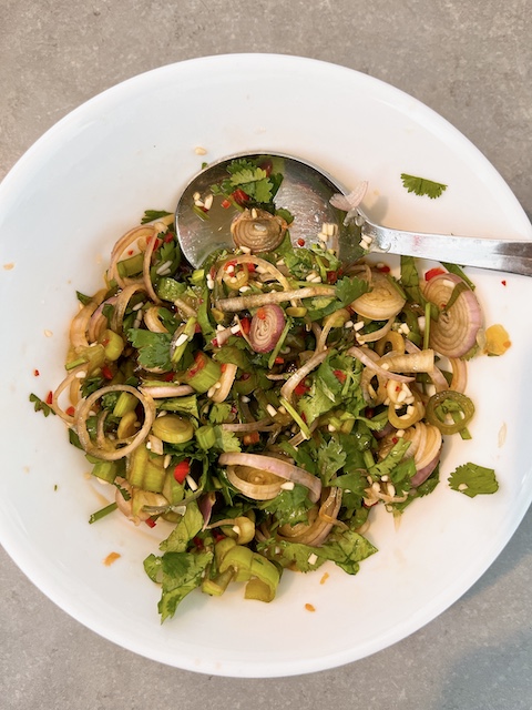 A mushroom salad with vegan Thai  nam tok sauce.