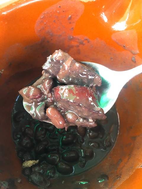 Black beans and pork in a feijoada.