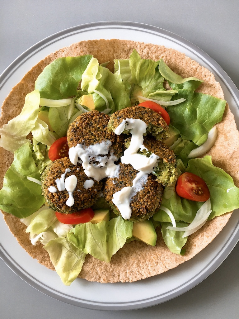 Falafel wrap with yogurt.