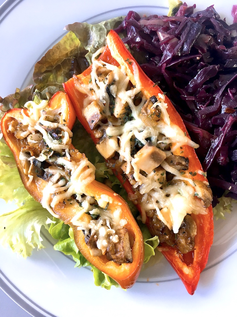 Stuffed Romano peppers with cheesy mushrooms.