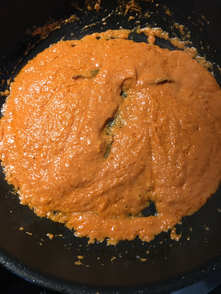 Making makhanwala sauce (tomato cream sauce).