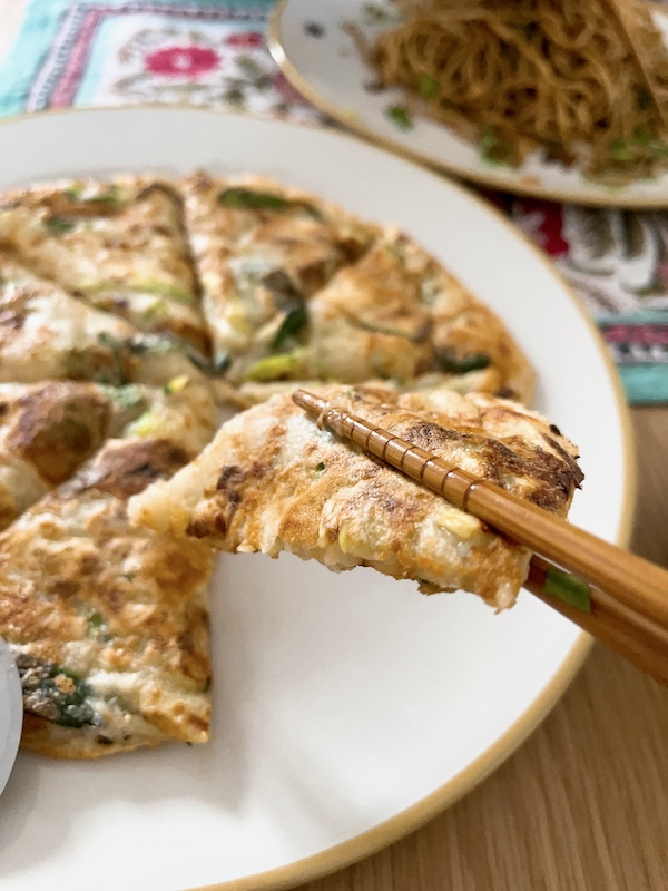 A slice of perfect cheesy courgette pancake.