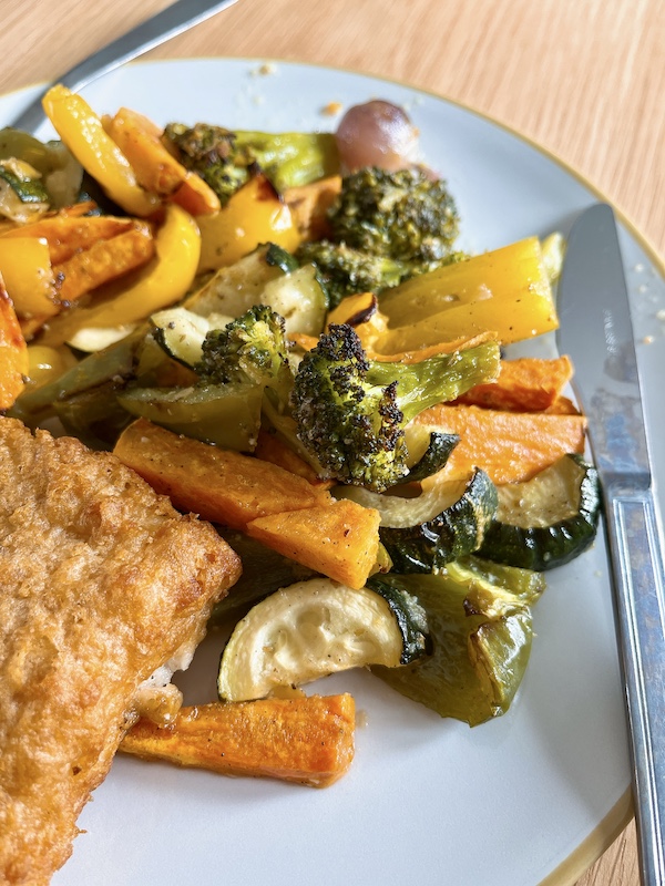 A healthy lunch idea - roast fish with different vegetables in one shot.