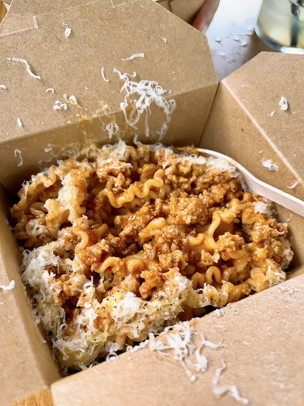 MAGARI ragu pasta in a paper box.