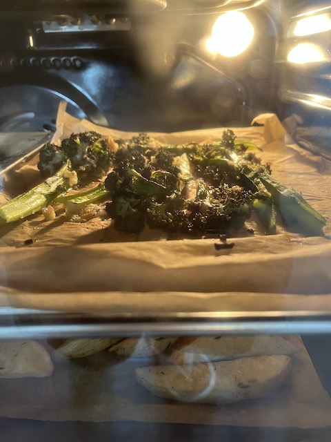 Roasting purple sprouting broccoli. 