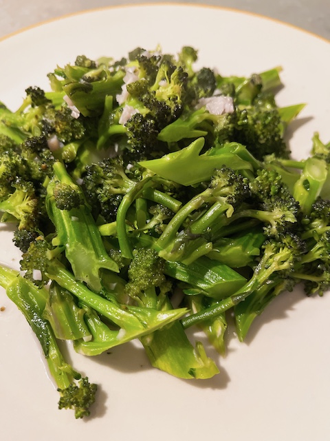 Stir-fried purple sprouting broccoli