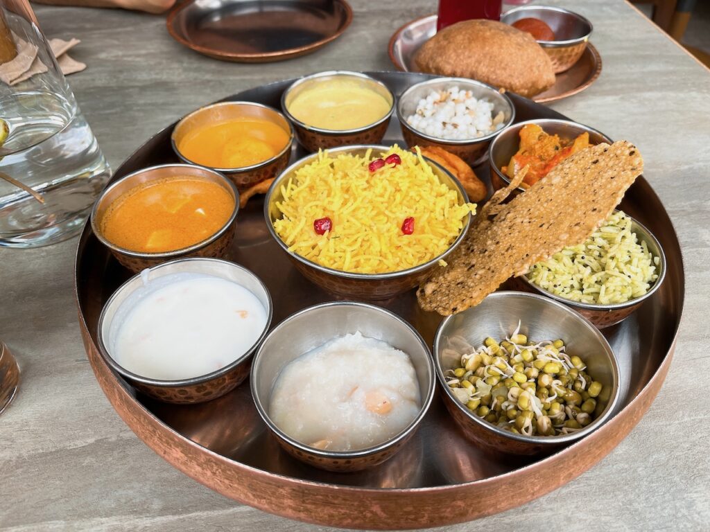 GoNative Navratri thali with 14 different items.