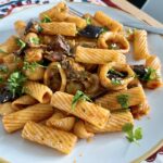 Confit squid with roasted aubergine and pasta.