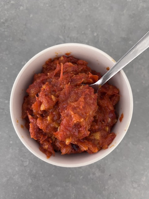 Harissa sauce in a ramekin.