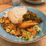 Jamaican ackee and mushroom rice dish in restaurant Caribbean Croft, Bristol.