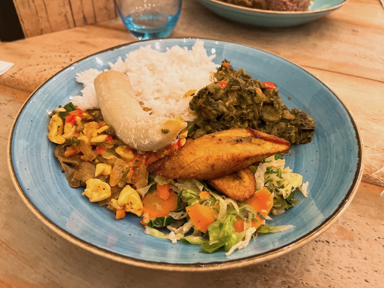 Jamaican ackee and mushroom rice dish in restaurant Caribbean Croft, Bristol.