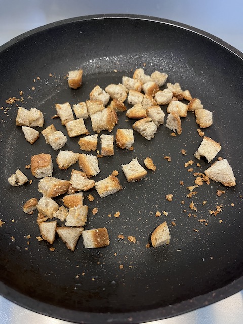 Making of muddica atturrata, toasted breadcrumbs.