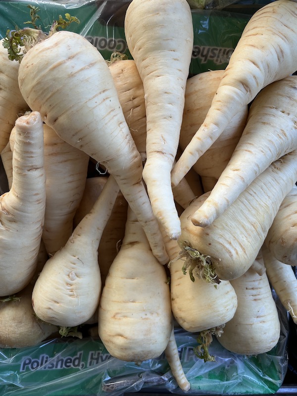 Parsnips selling in a market.