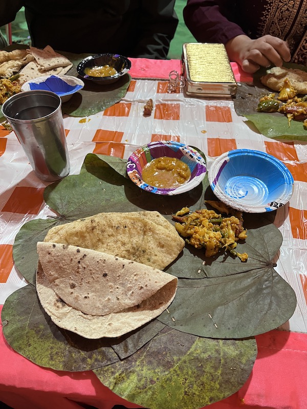 Food served on a leaf in an Indian wedding.