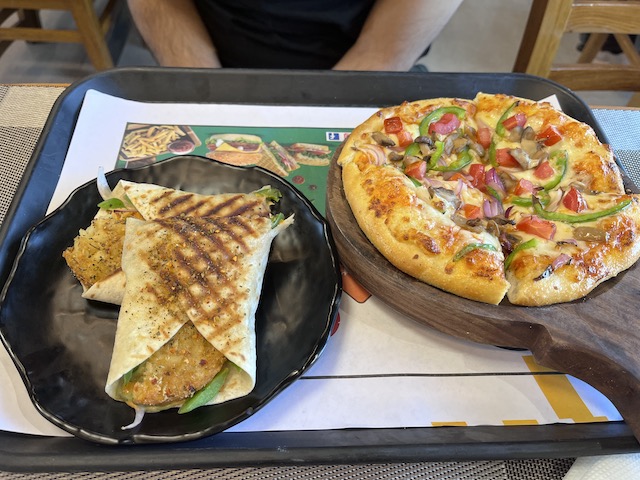 Veg wrap and pizza in a cafe in North India.