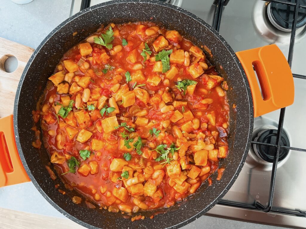 Vegan bouillabaisse with celeriac and beans.