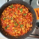 Vegan bouillabaisse with celeriac and beans.