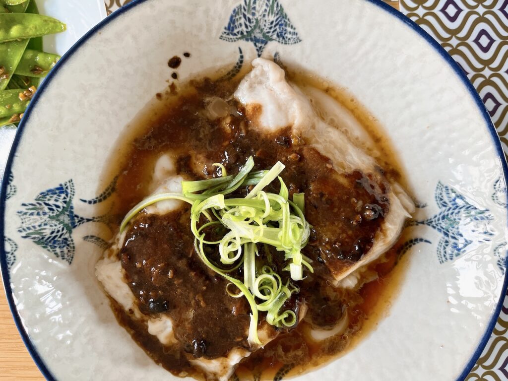 Steamed hake with black bean sauce.