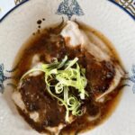 Steamed hake with black bean sauce.