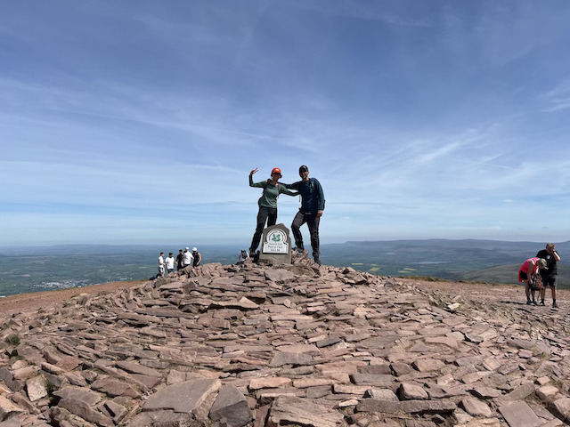 Taking photo at the peak of Pen y Fan.