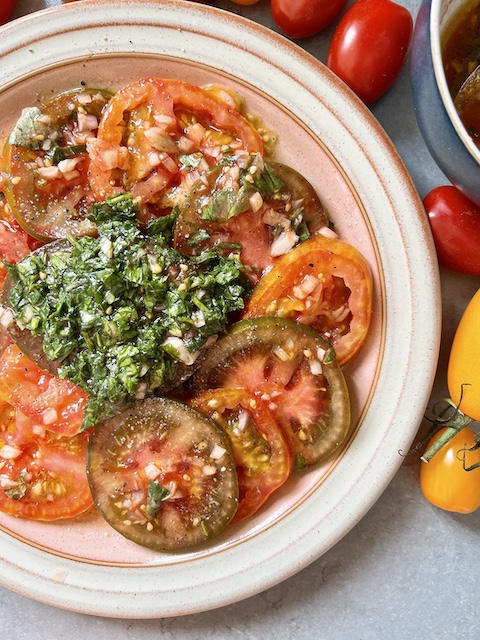 Heritage tomato salad with tomato vinaigrette.