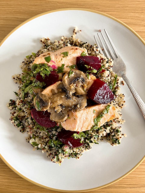 Salmon and beetroot quinoa salad with lemon vinaigrette.