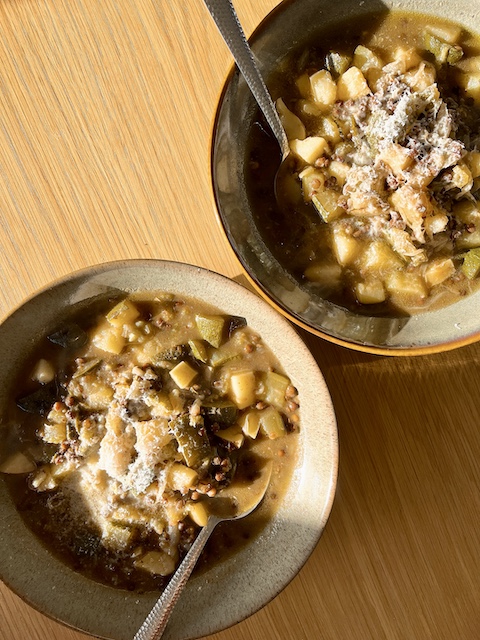 Two bowls of Puy lentils, courgette and rosemary soup.