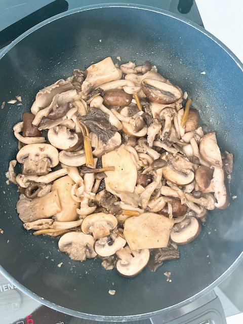 Finishing of sautéing mushroom medley.
