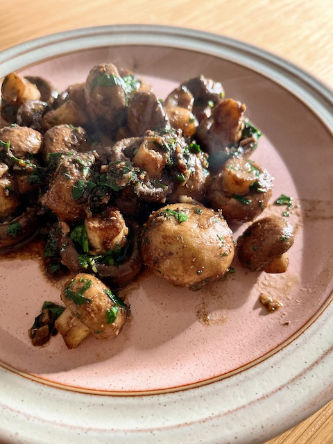 Sautéed mushrooms with allspice and sage.