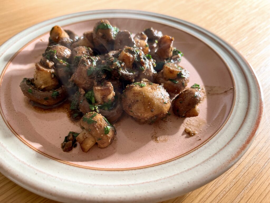 Sautéed mushrooms with allspice and sage.